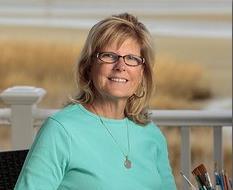 Margie Brauer on a porch at the shore