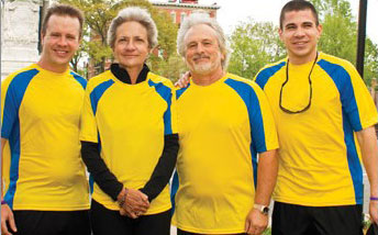 Connie Madison posing with her team