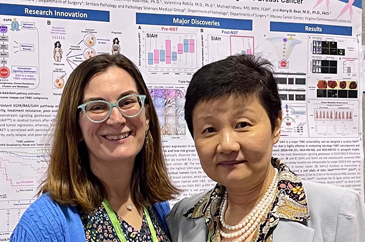 Koblinski and Tang pictured at AACR poster session