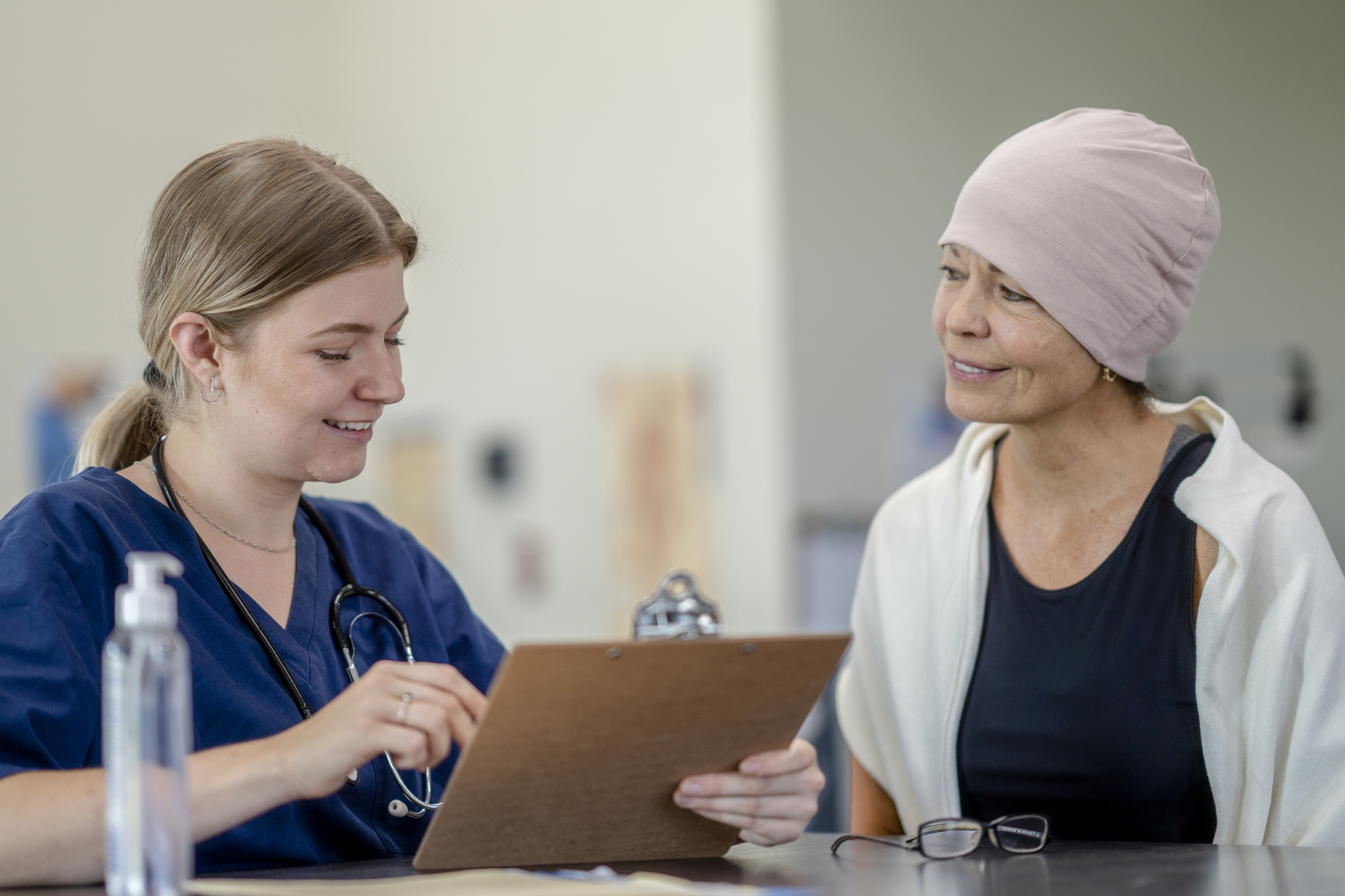 Breast cancer patient speaking with nurse