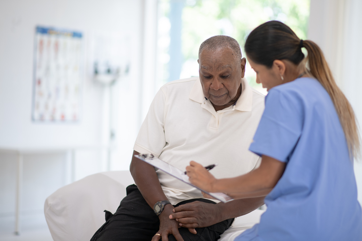 Patient in discussion with physician